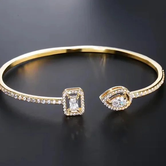 Elegant Gold Bangle with Crystal Accents - Picture 2 of 4